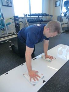 Stabilization exercises using a slideboard or on wood/laminate flooring. This should only be done once proper strength & range of motion are achieved. The patient should "round" out their shoulders and perform movements like letters of the alphabet while maintaining proper shoulder position. 