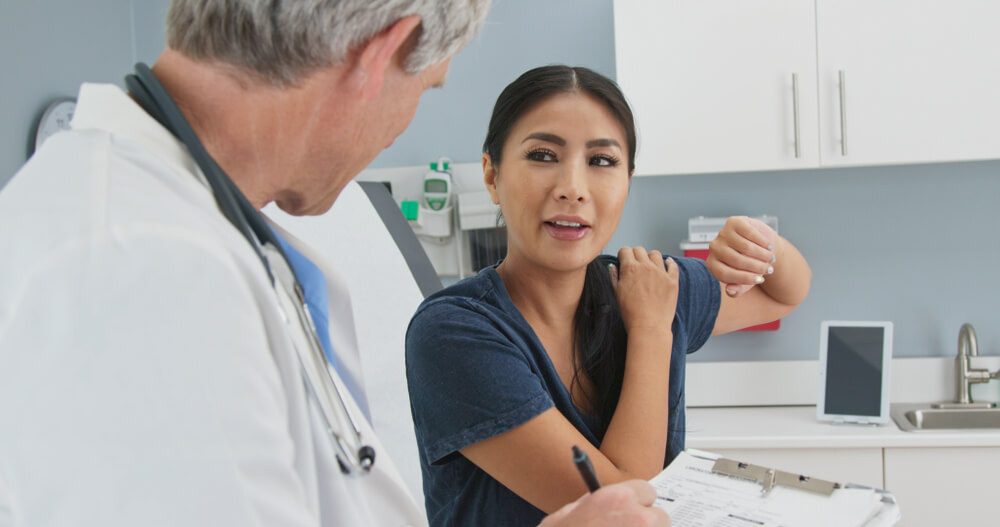 I fell on my shoulder and it hurts to raise my arm: What do I do? shutterstock 1318617584 fell on shoulder hurts to raise arm