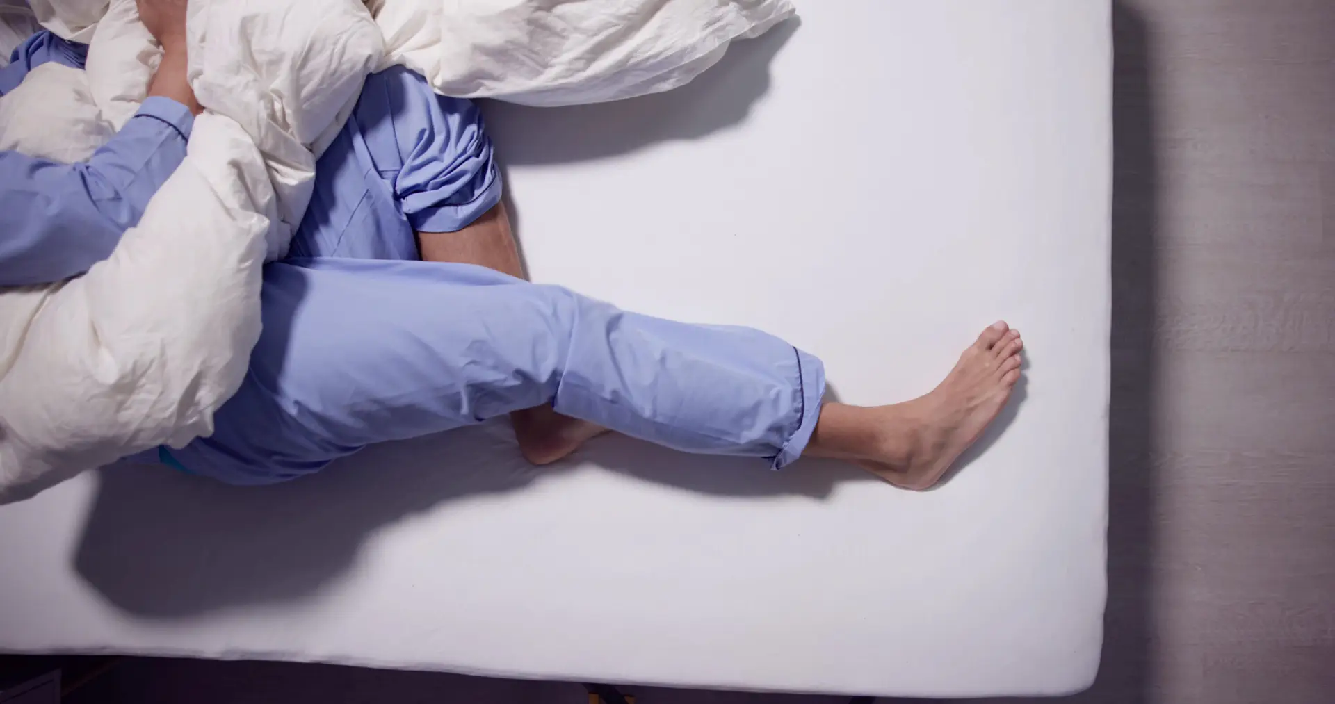 6 Reasons You Have Leg Pain When Lying Down AdobeStock 609398943 scaled 1 6 Reasons You Have Leg Pain When Lying Down